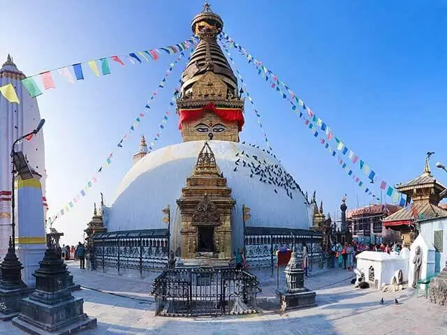 Prayer flags strung from the Swayambhunath stupa in Kathmandu, Nepal