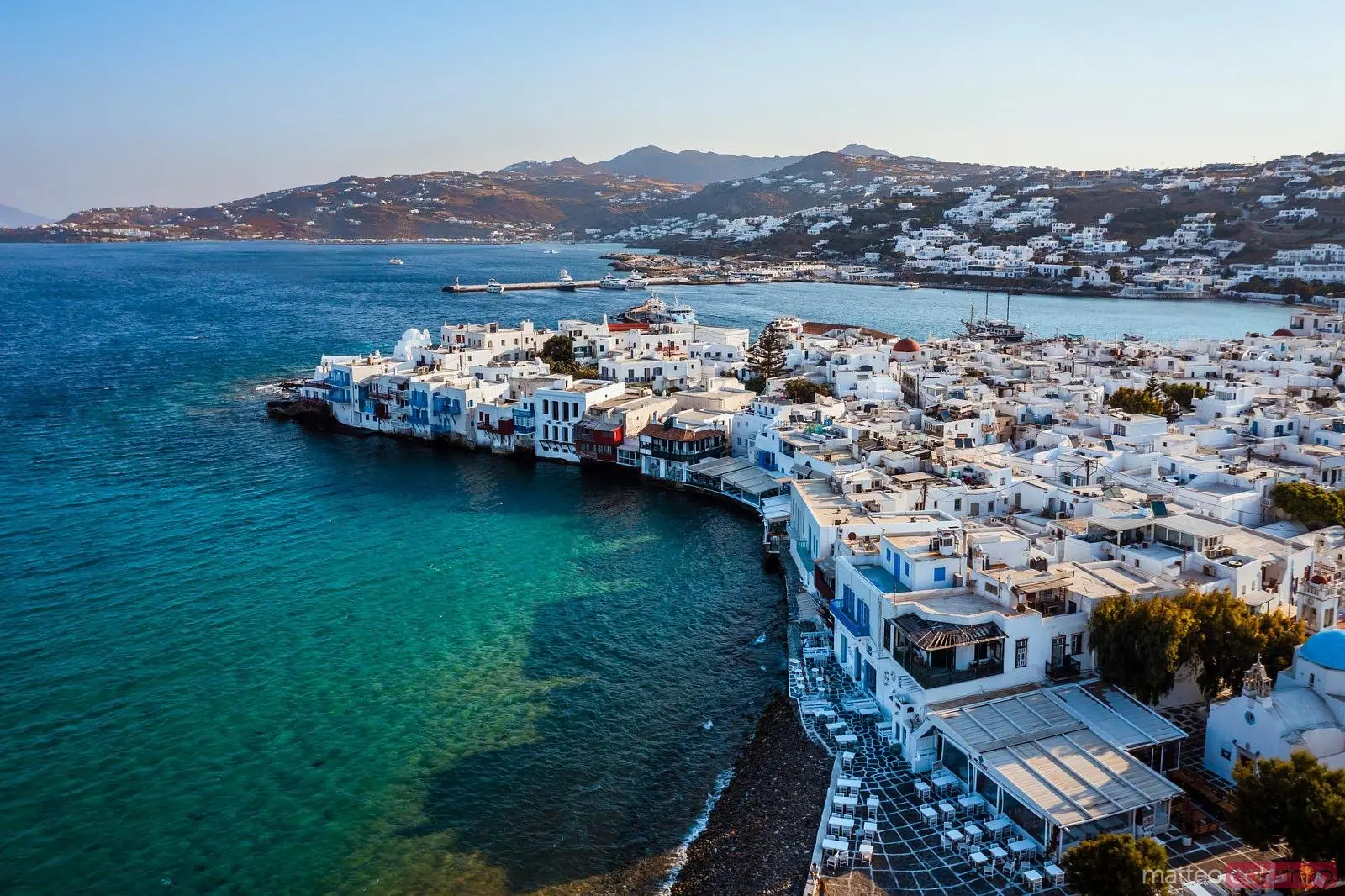 Whitewashed houses along the waterfront on Mykonos, Greece