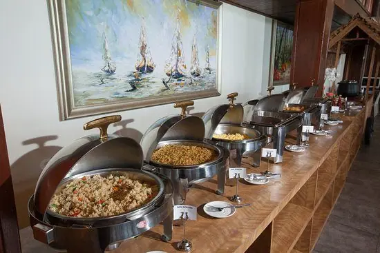 A buffet line laid out in a ship's dining room