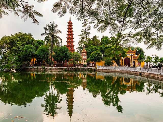 Trang An Grottoes Ninh Binh sampan boat river caves UNESCO Vietnam